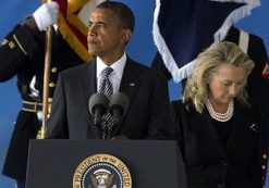 President Obama, left, and Hillary Clinton, right, at the ceremony for the victims of Benghazi on Sept. 14, 2012.