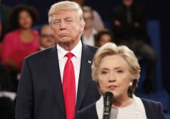 Republican presidential nominee Donald Trump looks on as Democratic presidential nominee Hillary Clinton answers a question during the second presidential debate at Washington University in St. Louis, Sunday, Oct. 9, 2016. (Photo: Reuters)