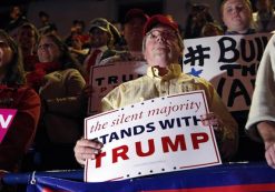 People hold signs during a campaign rally for Republican presidential candidate Donald Trump Monday, Nov. 7, 2016, in Scranton, Pennsylvania. (Photo: AP)
