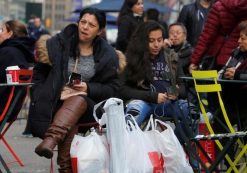 A woman sits in Herald Square with bags of shopping during Black Friday sales in Manhattan, New York, U.S., November 25, 2016. (Photo: REUTERS)