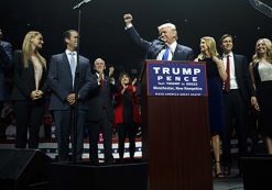 Republican presidential candidate Donald Trump pumps his fist as he arrives to speak during a campaign rally, Monday, Nov. 7, 2016, in Manchester, N.H. From back left are Eric Trump, Vanessa Trump, Donald Trump Jr., Republican vice presidential candidate Gov. Mike Pence, R-Ind., Karen Pence, Ivanka Trump, Jared Kushner, and Tiffany Trump. (Photo: AP)