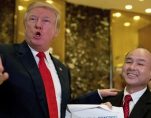 President-elect Donald Trump, accompanied by SoftBank CEO Masayoshi Son, speaks to members of the media at Trump Tower in New York, Tuesday, Dec. 6, 2016. (Photo: AP)