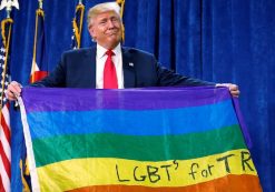 Then-presidential candidate Donald J. Trump holds up a rainbow flag with LGBTs for Trump written on it at a rally in Greeley, Colorado. (Photo: Reuters)