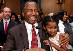 Dr. Ben Carson gets a hug from his granddaughter Tesora as he takes his seat to testify before a Senate Banking, Housing and Urban Affairs Committee confirmation hearing on his nomination to be Secretary of the U.S. Department of Housing and Urban Development on Capitol Hill in Washington, January 12, 2017. (Photo: Reuters)