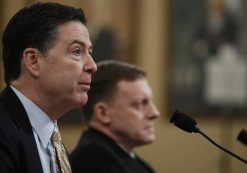 FBI Director James Comey, left, accompanied by National Security Agency Director Michael Rogers, testifies on Capitol Hill in Washington Monday. (Photo: AP)