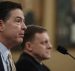 FBI Director James Comey, left, accompanied by National Security Agency Director Michael Rogers, testifies on Capitol Hill in Washington Monday. (Photo: AP)