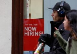 People walk past a ''Now Hiring'' sign in Manhattan in New York City, U.S., May 10, 2016. (Photo: Reuters)