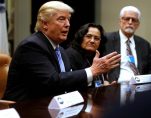 U.S. President Donald J. Trump (C), flanked by Gary Masino (L) of the Sheet Metal Workers Union, Telma Mata (2nd R) of the Heat and Frost Insulators Allied Workers Local 24 and United Brotherhood of Carpenters General President Doug McCarron (R), holds a roundtable meeting at the White House on Jan. 27. 2017. (Photo: Reuters)