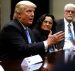 U.S. President Donald J. Trump (C), flanked by Gary Masino (L) of the Sheet Metal Workers Union, Telma Mata (2nd R) of the Heat and Frost Insulators Allied Workers Local 24 and United Brotherhood of Carpenters General President Doug McCarron (R), holds a roundtable meeting at the White House on Jan. 27. 2017. (Photo: Reuters)