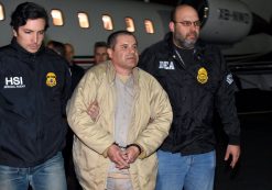 U.S. law enforcement authorities escort Joaquin 