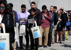 People wait in line to attend TechFair LA in Los Angeles, Calif. (Photo: Reuters)