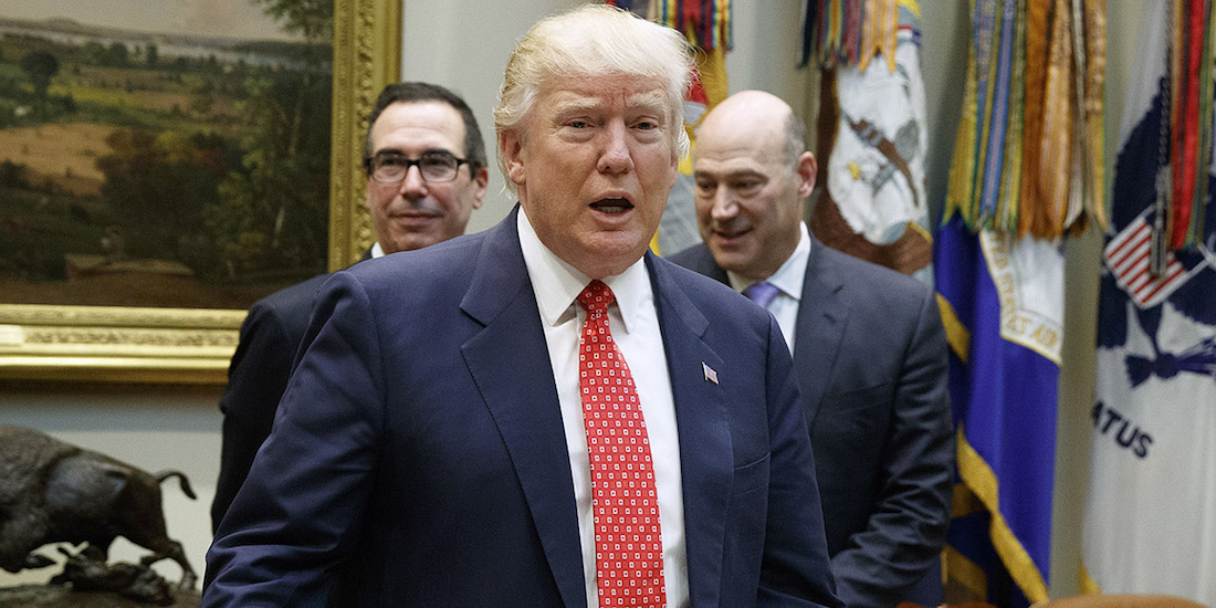 President Donald Trump, followed by Treasury Secretary Steven Mnuchin, left, and White House Economic Council Director Gary Cohn arrives for a meeting on the Federal budget, Wednesday, Feb. 22, 2017, in the Roosevelt Room of the White House in Washington. (AP Photo/Evan Vucci)