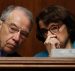 Sen. Dianne Feinstein, D-Calif., whispers something into the ear of her colleague Sen. Chuck Grassley, R-Ia., during a Senate hearing. (Photo: AP)