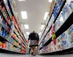 A shopper walks down an aisle in a newly opened Walmart Neighborhood Market in Chicago in this September 21, 2011. (Photo: Reuters)