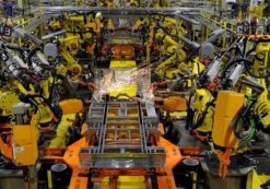 Robotic arms spot welds on the chassis of a Ford Transit Van under assembly at the Ford Claycomo Assembly Plant in Claycomo, Missouri April 30, 2014. (Photo: Reuters)