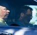 Montana Republican candidate Greg Gianforte sits in a car.