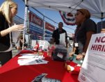 People browse booths at a military veterans' job fair in Carson, California October 3, 2014. (Photo: Reuters)