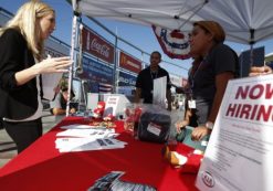 People browse booths at a military veterans' job fair in Carson, California October 3, 2014. (Photo: Reuters)