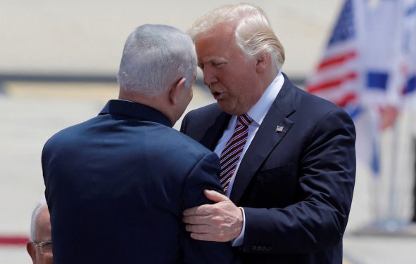 U.S. President Donald Trump (R) hugs Israeli Prime Minister Benjamin Netanyahu upon his arrival at Ben Gurion International Airport in Lod near Tel Aviv, Israel May 22, 2017. (Photo: Reuters)