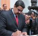 Venezuela's President Nicolas Maduro (C) attends a ceremony to sign off the 2017 national budget at the National Pantheon in Caracas, Venezuela October 14, 2016. (Photo: Miraflores Palace/Handout)