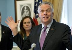 Virginia Gov. Terry McAuliffe, right, gestures during a news conference as his wife, Dorothy and Lt. Gov. Ralph Northam, left, listen at the Capitol in Richmond, Va., Tuesday, Jan. 10, 2017. (Photo: AP)