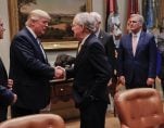 President Donald Trump, second from left, with Vice President Mike Pence, left, shakes hands with Senate Majority Leader Mitch McConnell, R-Kty., center, before the start of a meeting with House and Senate leaders at the White House. (Photo: AP)