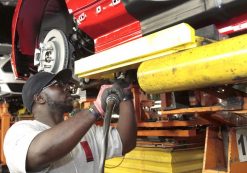 An assembly worker works on 2015 Ford Mustang vehicles on the production line at the Ford Motor Flat Rock Assembly Plant in Flat Rock, Michigan, August 20, 2015. (Photo: Reuters)