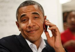 President Barack Obama reacts after realizing he dialed the wrong number while making calls from a local campaign field office during a unscheduled visit, Sunday, Oct. 28, 2012 in Orlando, Fla. (Photo: AP)