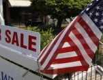 A U.S. flag decorates a for-sale sign at a home in the Capitol Hill neighborhood of Washington, August 21, 2012. (Photo: Reuters)