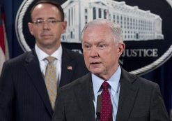 Attorney General Jeff Sessions, center, and Deputy Attorney General Rod Rosenstein, to his right, hold a press conference announcing the dismantling of the largest dark website in the world on July 20, 2017. (Photo: AP)