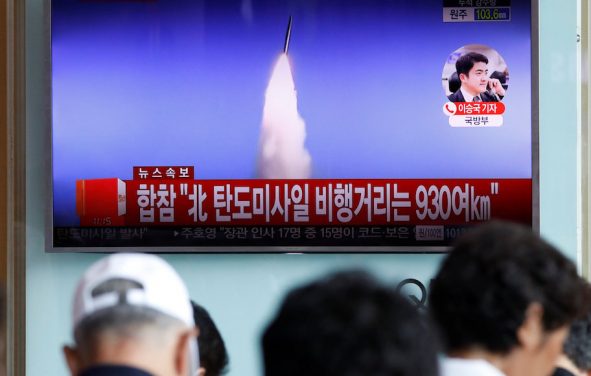 People watch a TV broadcast of a news report on North Korea's ballistic missile test, at a railway station in Seoul, South Korea, July 4, 2017. (Photo: Reuters)