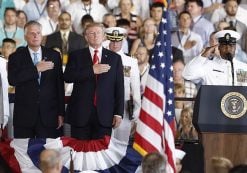 President Donald J. Trump stands for the colors as he arrives during the commissioning ceremony of the aircraft carrier USS Gerald R. Ford (CVN 78) at Naval Station Norfolk, Va., Saturday, July, 22, 2017. (Photo: AP)