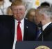 President Donald Trump left, waves to the crowd as he is introduced by Defense Secretary James Mattis, right, aboard the nuclear aircraft carrier USS Gerald R. Ford for it's commissioning at Naval Station Norfolk in Norfolk, Va., Saturday, July 22, 2017. (Photo: AP)