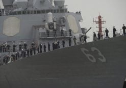 US navy sailors stand in formation on the deck as USS Stethem (DDG 63) destroyer vessel arrives at a military port for an official visit, in Shanghai, China. (Photo: Reuters)