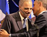 U.S. President Barack Obama greets outgoing U.S. Attorney General Eric Holder at Holder's portrait unveiling ceremony at The Department of Justice in Washington, DC, February 27, 2015. (Photo: AP)