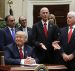 Florida Gov. Rick Scott, center, delivers brief remarks after President Donald J. Trump signed the Veterans Choice Program And Improvement Act with representatives of veterans’ organizations, politicians and members of his administration, including Veterans Affairs Secretary David Shulkin, in the Roosevelt Room at the White House on Wednesday in Washington, DC. (Photo: Reuters)