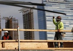 Men work on a construction site for a luxury apartment complex in downtown Los Angeles, California March 17, 2015. (Photo: Reuters)