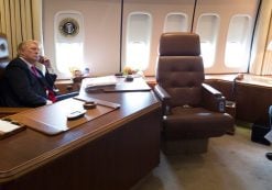 President Donald J. Trump speaks with Texas Governor Greg Abbott while aboard Air Force One, as Chief of Staff General John Kelly listens, en route to Joint Base Andrews in Washington, D.C., Wednesday August 30, 2017. (Official White House Photo by Joyce N. Boghosian)