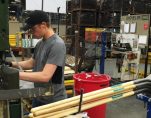 A production line employee works at the AMES Companies shovel manufacturing factory in Camp Hill, Pennsylvania, U.S. on June 29, 2017. (Photo: Reuters)