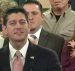 House Speaker Paul Ryan, R-Wis., holds up a post card form during the introduction of the Republican tax reform plan, dubbed the 