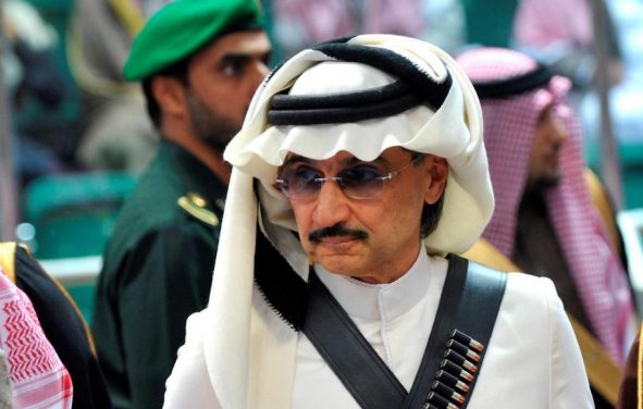 Prince Alwaleed bin Talal attends the traditional Saudi dance known as 'Arda', which was performed during Janadriya culture festival at Der'iya in Riyadh February 18, 2014. (Photo: Reuters)