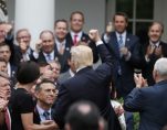 U.S. President Donald Trump, center, celebrates with Congressional Republicans in the Rose Garden of the White House after the U.S. House of Representatives and Senate approved the American Healthcare Act, to repeal major parts of ObamaCare and replace it with the Republican healthcare plan, in Washington, U.S., May 4, 2017. (Photo: Reuters)