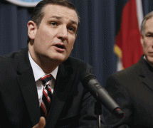 U.S. Sen. Ted Cruz, R-Texas, left, and Texas Republican Governor Greg Abbott, right, hold a joint press conference February 18, 2015 in Austin, Texas.