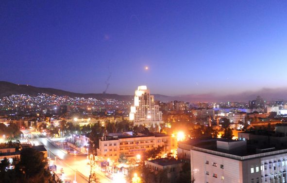 A missile is seen crossing over Damascus, Syria April 14, 2018. (Photo: SANA/Handout via Reuters)