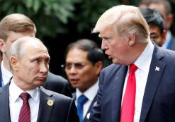 U.S. President Donald Trump and Russia's President Vladimir Putin talk during the family photo session at the APEC Summit in Danang, Vietnam November 11, 2017. (Photo: Reuters)