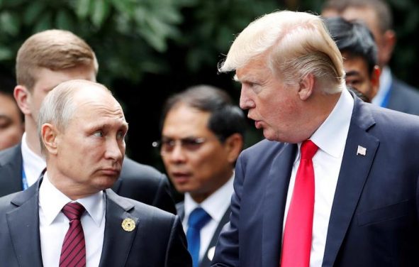 U.S. President Donald Trump and Russia's President Vladimir Putin talk during the family photo session at the APEC Summit in Danang, Vietnam November 11, 2017. (Photo: Reuters)