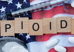 Scrabble-like text depicting opioids on an American flag to underscore the opioid epidemic in the United States. (Photo: AdobeStock)