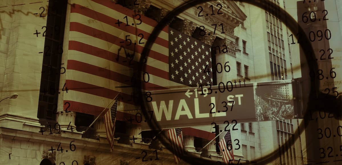 Graphic concept taking a magnifying glass to Wall Street. (Photo: AdobeStock)