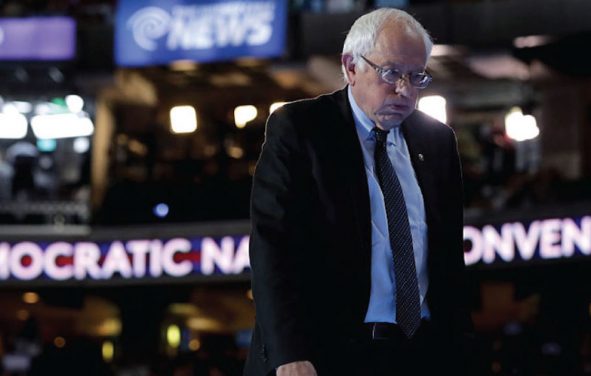 Bernie Sanders stands at the podium on stage during a walk through before the start of the Democratic National Convention (DNC) in Philadelphia, Pennsylvania on July 25, 2016. (Photo: SS)