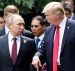 U.S. President Donald Trump and Russia's President Vladimir Putin talk during the family photo session at the APEC Summit in Danang, Vietnam November 11, 2017. (Photo: Reuters)